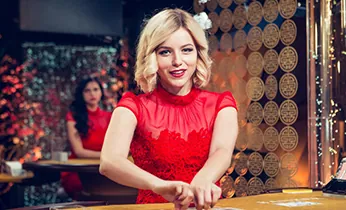 Trải nghiệm Sòng bạc Trực tuyến Baccarat tại QH88 với người chia bài xinh đẹp và bàn chơi sang trọng